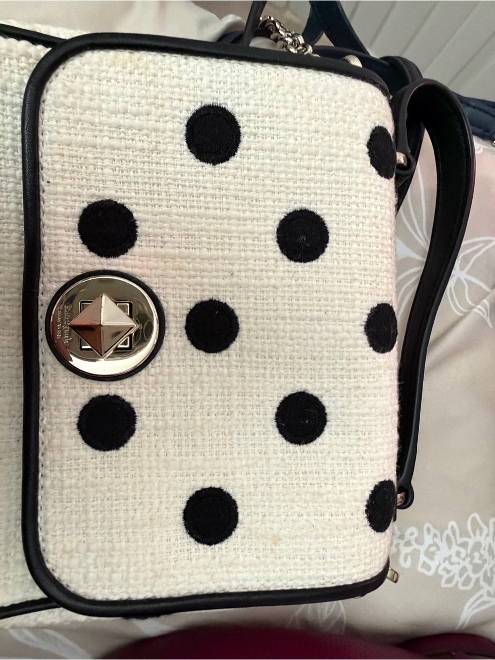 Polka Dot Crossbody Bag in White and Black with Turn-Lock Detail